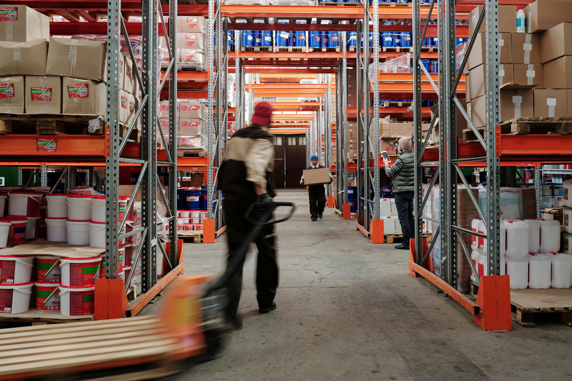 Warehouse operative moving stock in a warehouse